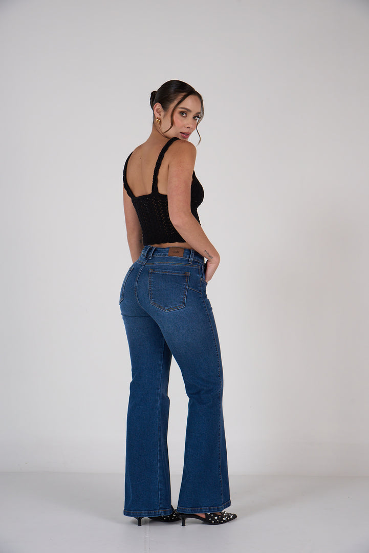 Ref: 552839 Jean dama flare tiro medio licrado, color Azul oscuro